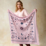 Pink cashmere wrap with celestial moon, star, and butterfly print pattern