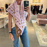 Pink and tan knit triangle scarf with celestial star and moon pattern