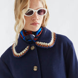 Fantastica navy blue coat with crochet-trimmed collar and gold buttons