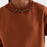Fantastica brown sweatshirt with beaded jeweled embellished crew neckline trim