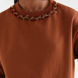 Fantastica brown sweatshirt with beaded jeweled embellished crew neckline trim