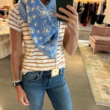 Freya Nebula Triangle Scarf in blue paisley print worn around neck