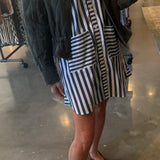 Navy and white striped button-front shirt dress with patch pockets, mini length
