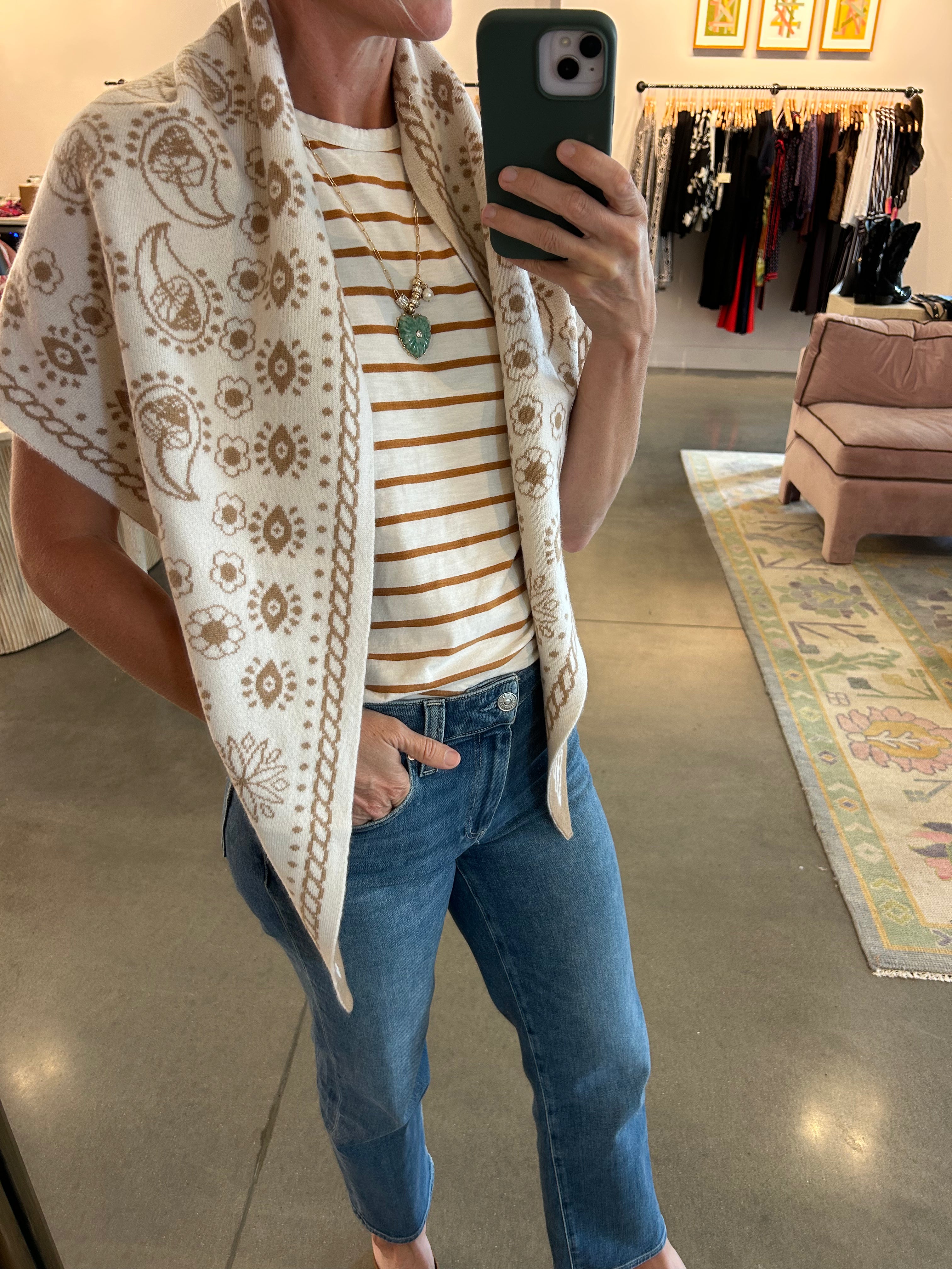 Cream and tan paisley floral knit triangle scarf worn as wrap vest