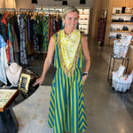 Sleeveless citron and teal stripe crop top with elastic waist, worn as dress