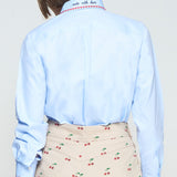 Blue button down with heart trim