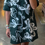 Deep forest green mini shift dress with white floral embroidery, short sleeves