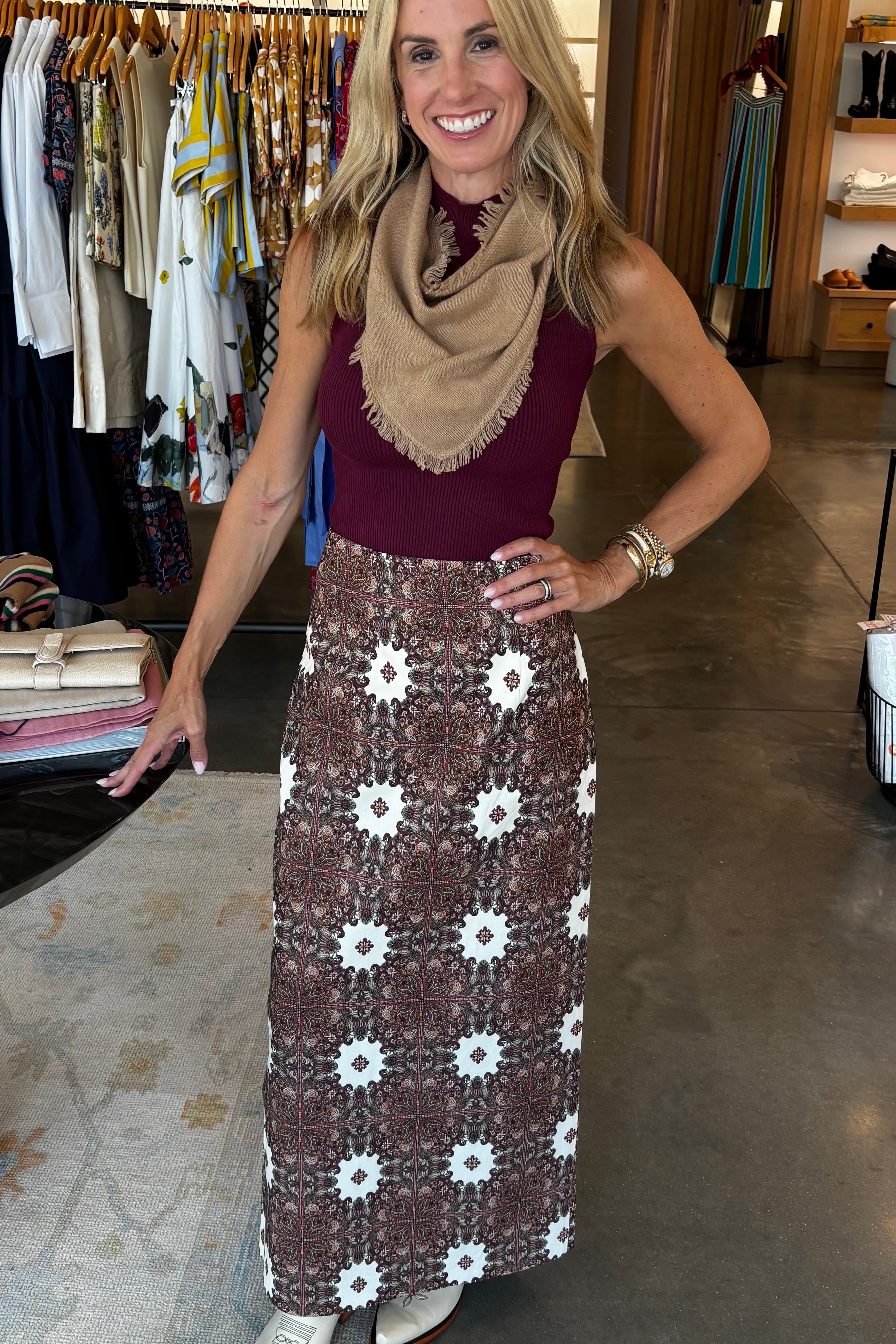 Burgundy sleeveless ribbed Miranda Tank by Marie Oliver, styled with printed maxi skirt