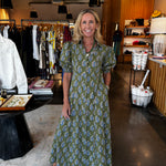 Olive green floral print maxi shirtdress with blue and white blooms, short sleeves