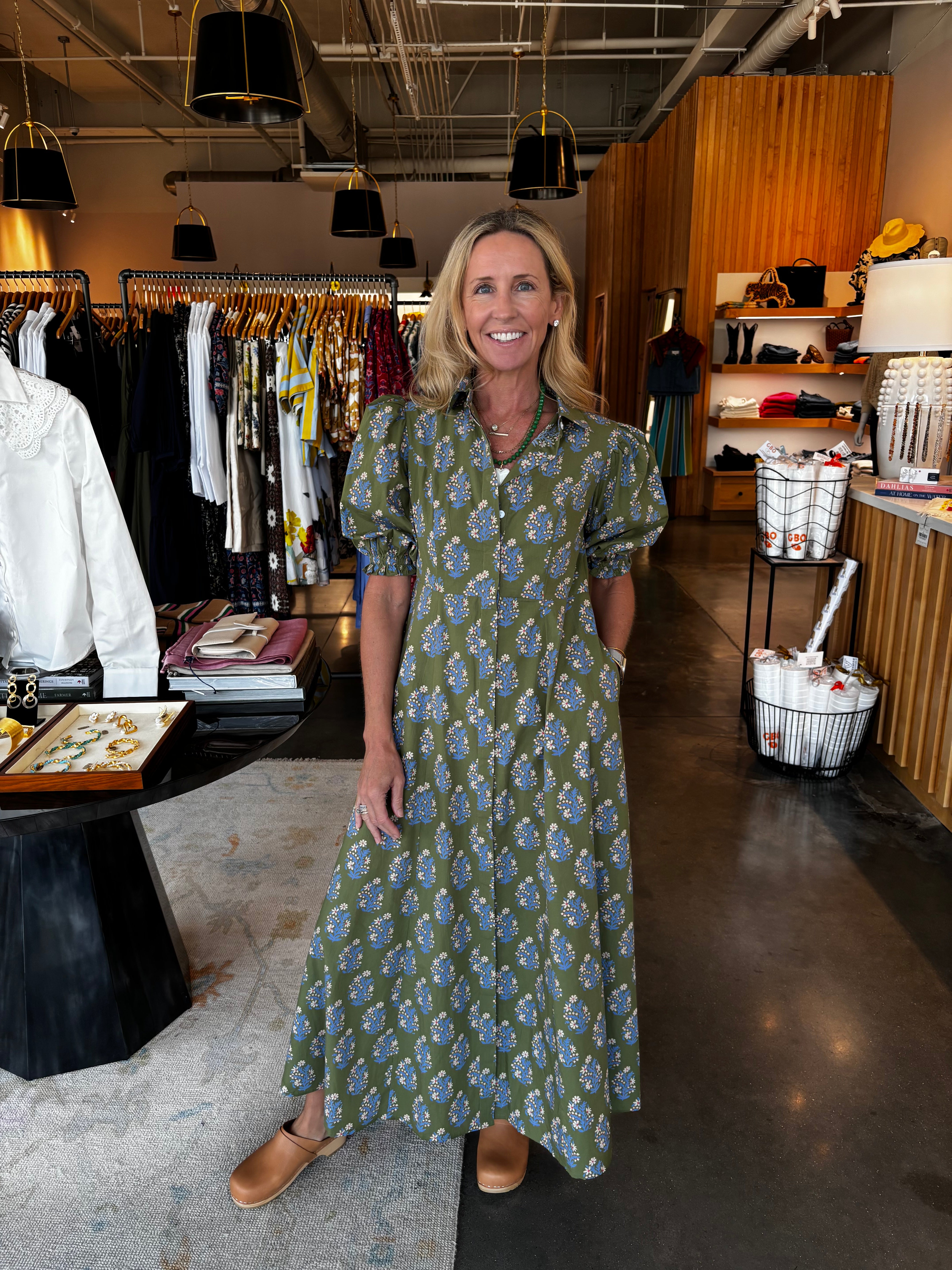Olive green floral print maxi shirtdress with blue and white blooms, short sleeves