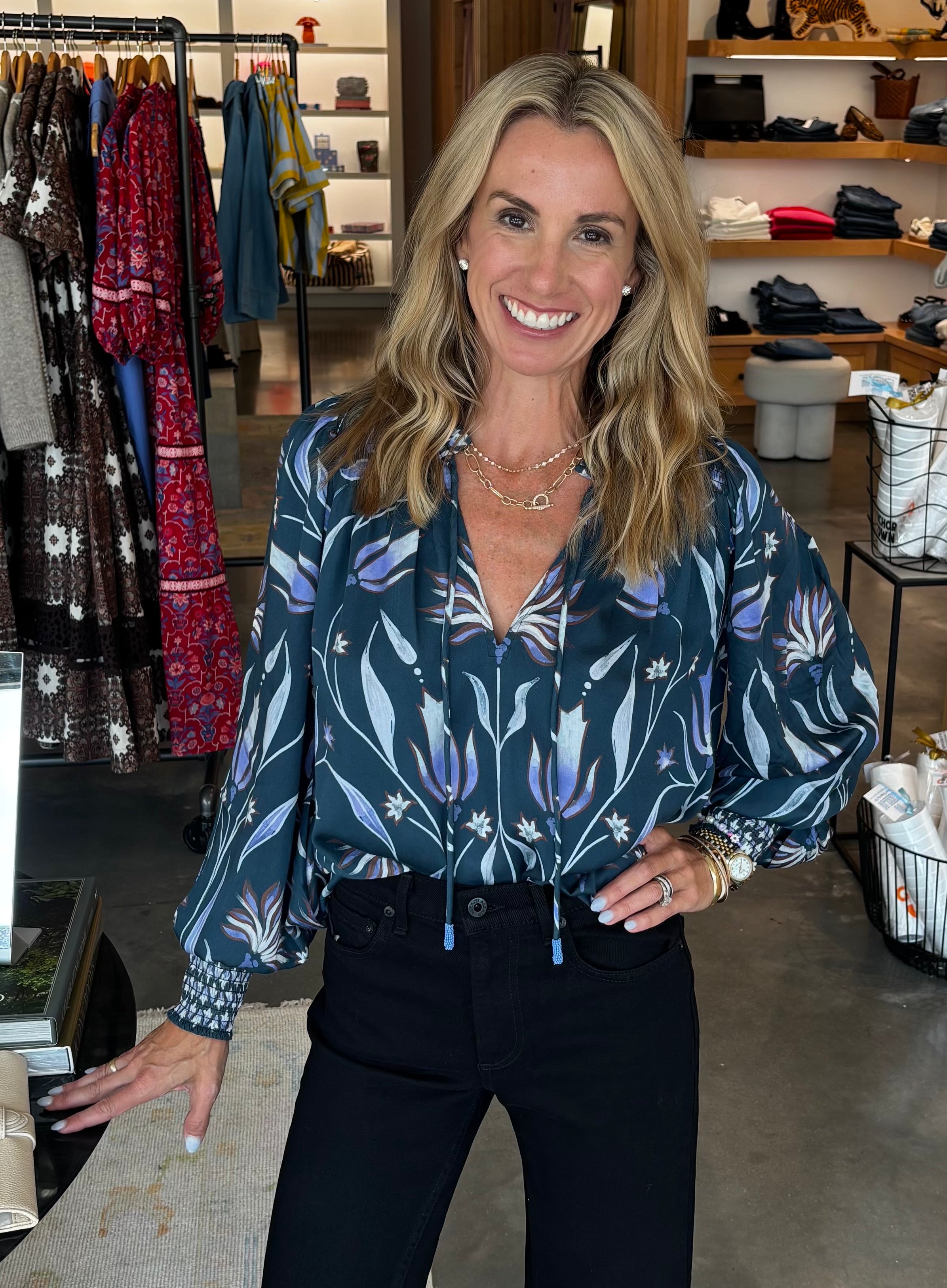 Anouk Blouse in dark teal floral print with smocked cuffs and tie neckline