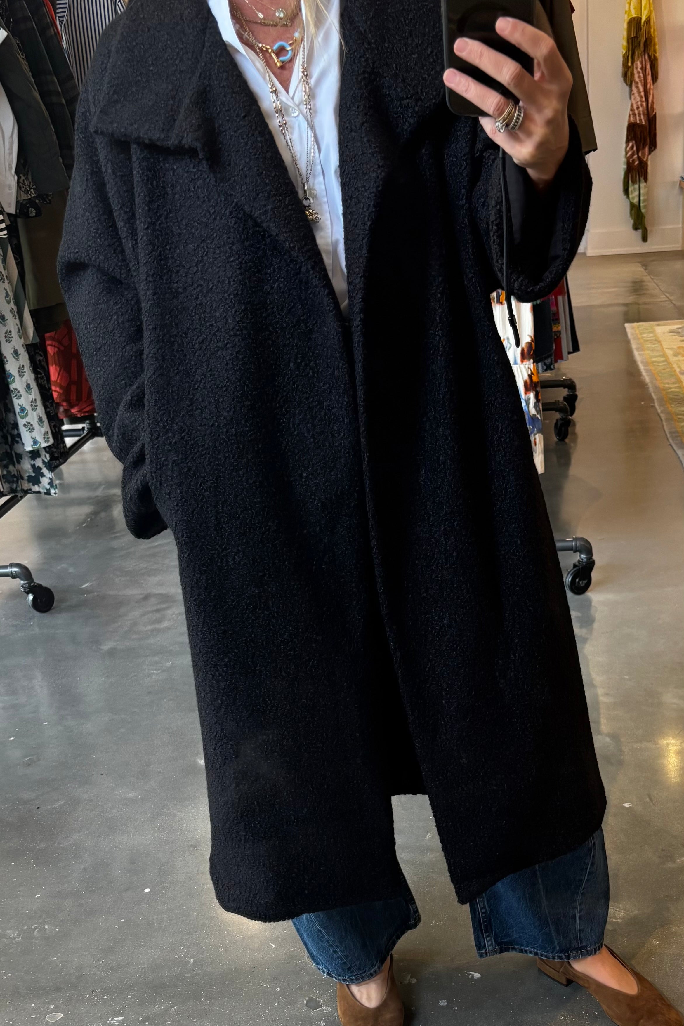 Black oversized bouclé longline coat with draped lapels, open front