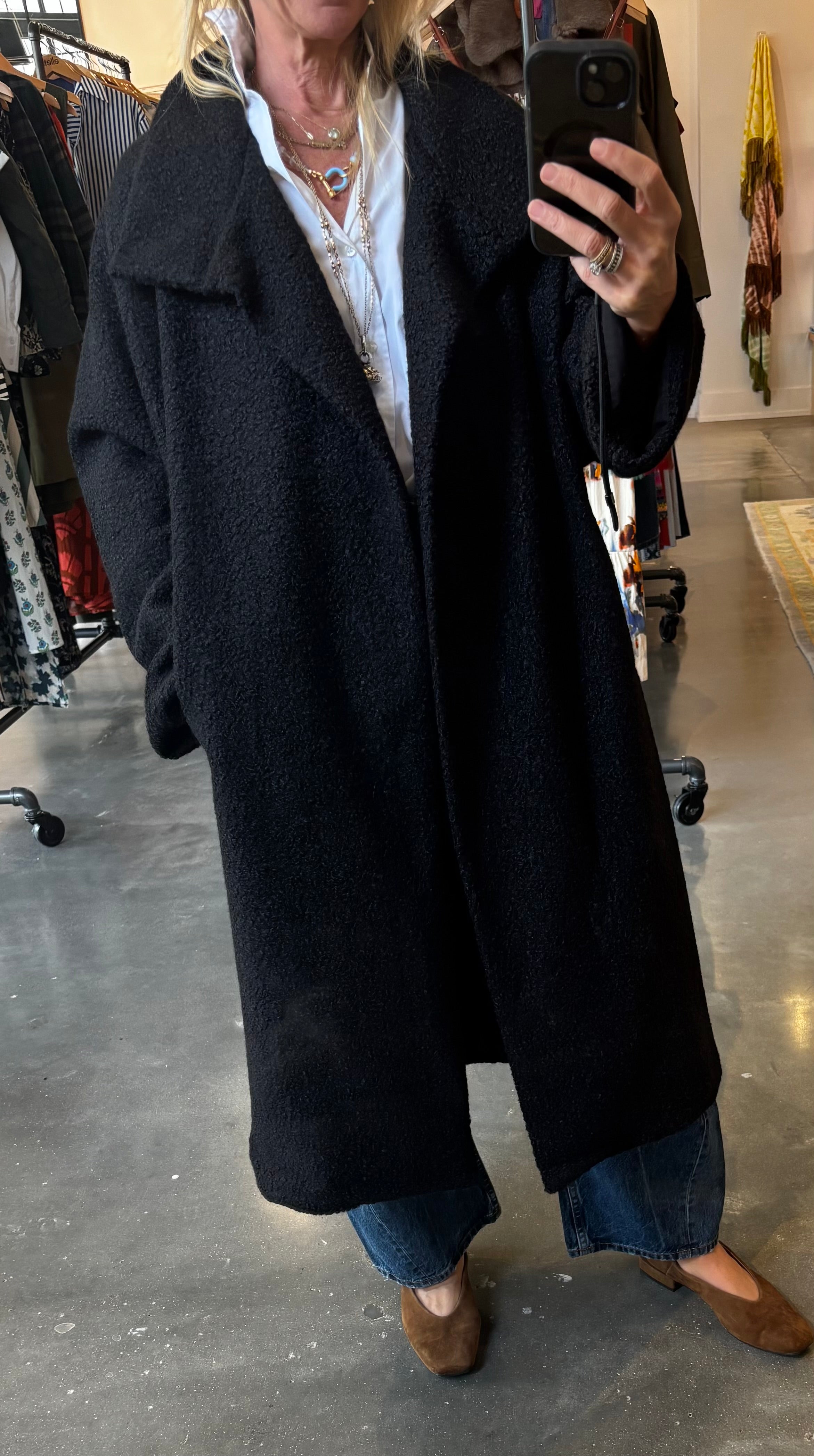Black oversized bouclé longline coat with draped lapels, open front