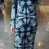 Navy maxi caftan dress with light blue floral print and long sleeves