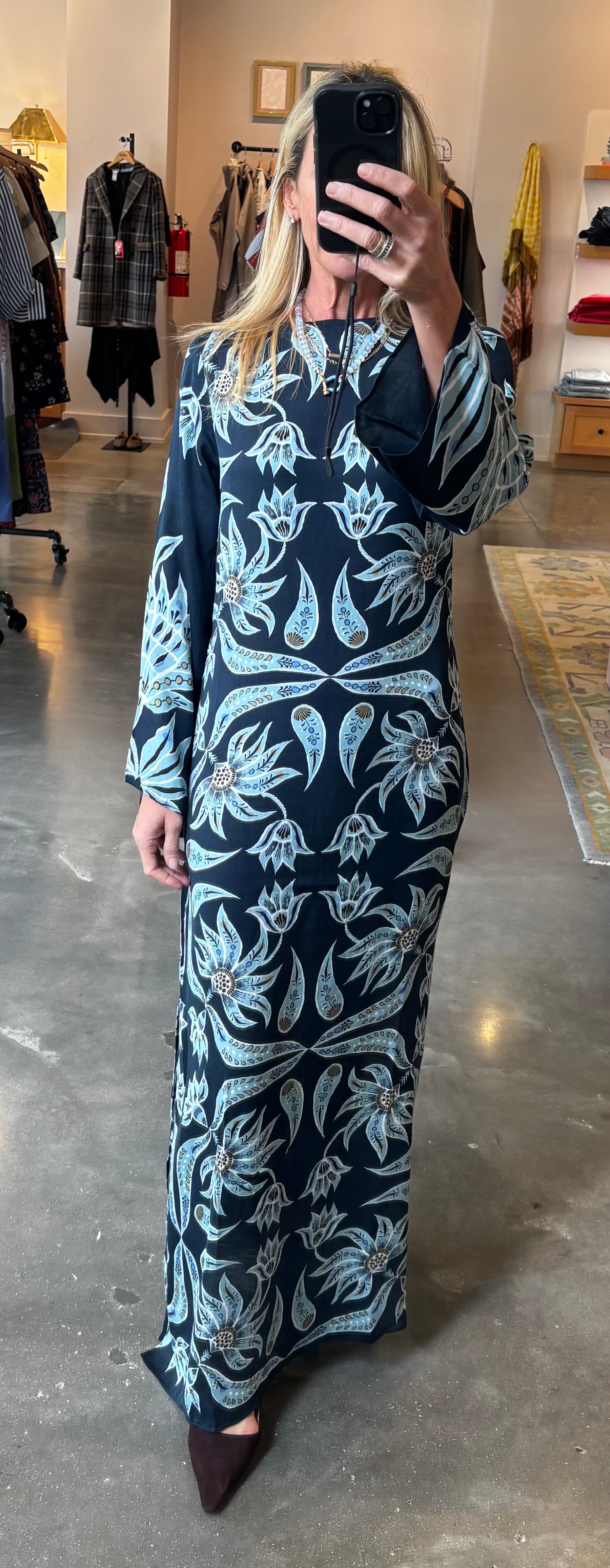 Navy maxi caftan dress with light blue floral print and long sleeves