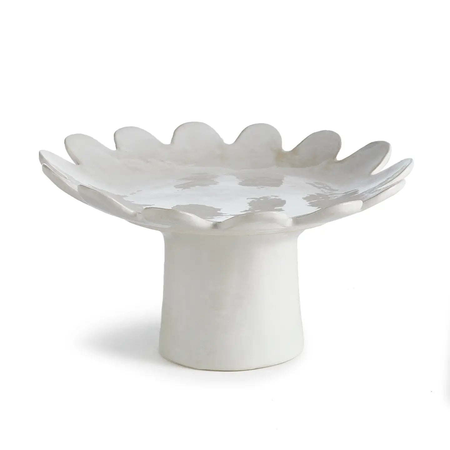 White ceramic pedestal tray with scalloped flower petal edge and cylindrical base