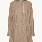 Isle Jacobsen Light Raincoat in beige with hood, drawstring waist, and snap buttons