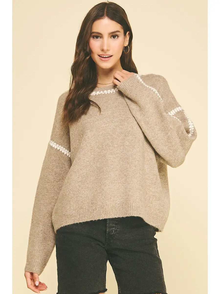 Women's taupe oversized crew neck sweater with white whipstitch embroidery detail