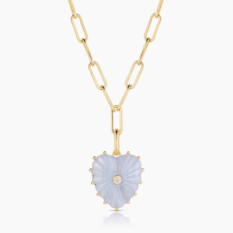Gold paperclip chain necklace with carved blue lace agate heart pendant and center diamond