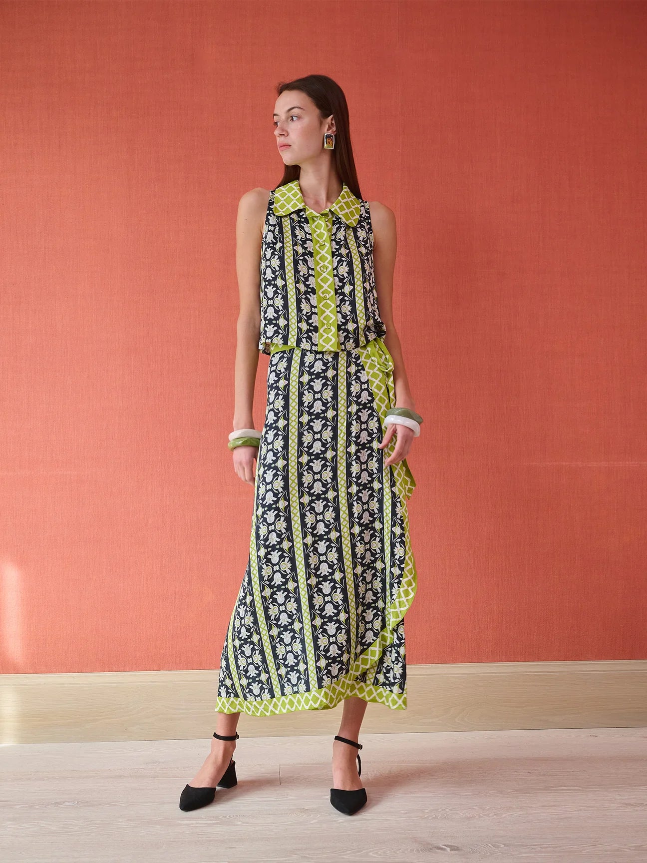 Olive green and navy floral print sleeveless button-down blouse with Peter Pan collar