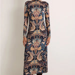 Long-sleeve midi turtleneck dress in navy and tan paisley print with slight A-line hem