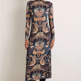 Long-sleeve midi turtleneck dress in navy and tan paisley print with slight A-line hem