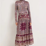Burgundy paisley maxi skirt with tiered hem and border print detail