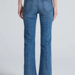 ASKK NY Split Boot Phoenix Jeans in medium blue denim, back view with raw hem slits