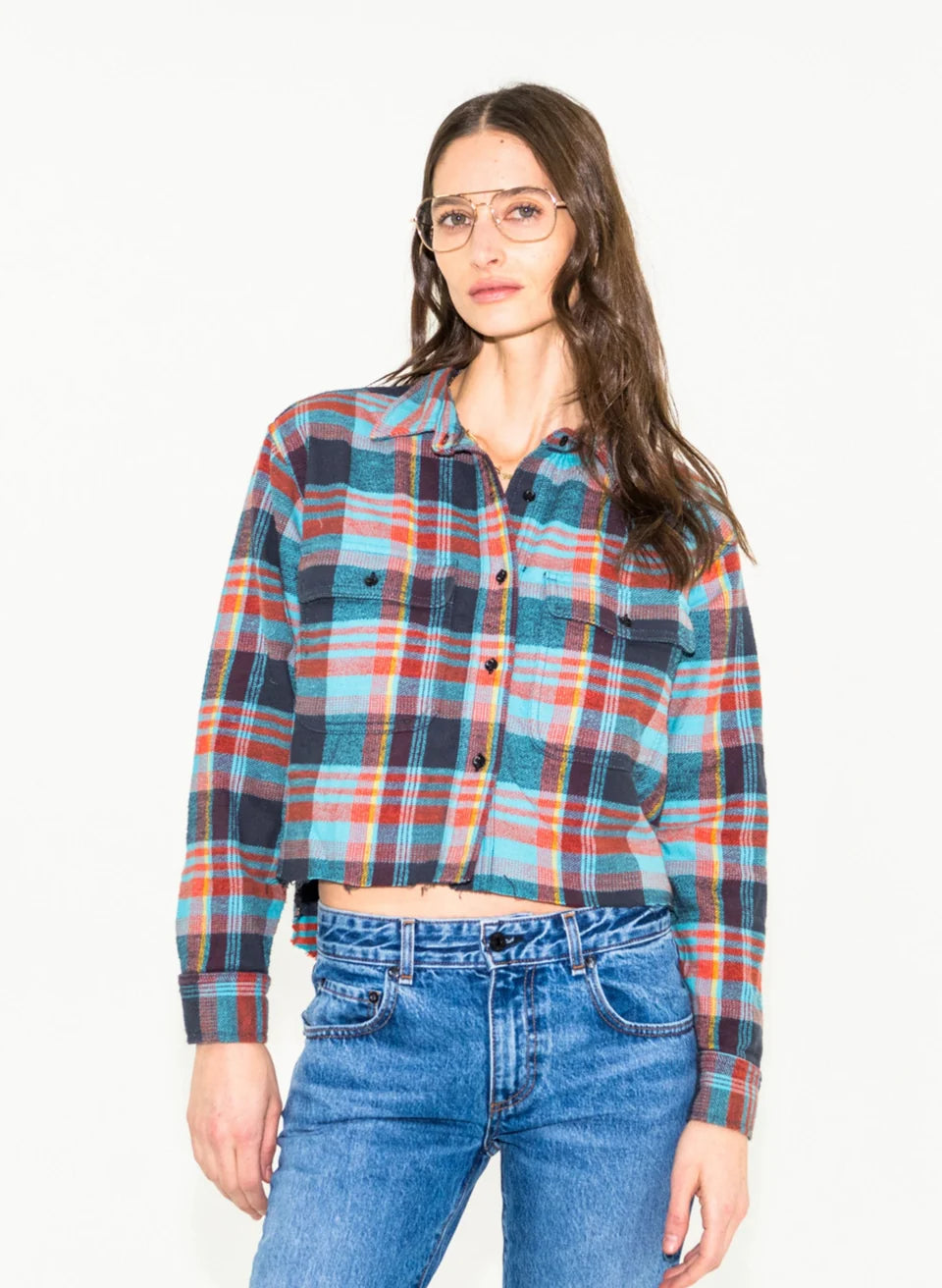 Cropped flannel plaid shirt in blue, red, and navy with button front