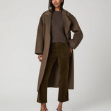 Dark olive green corduroy ankle pants with wide straight leg and patch pockets