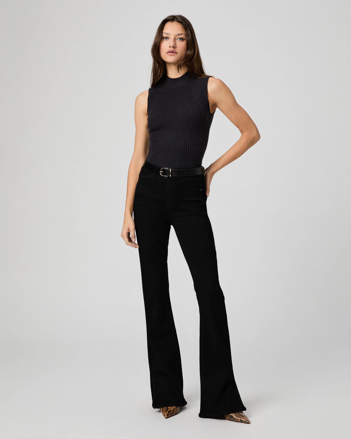 Black high-rise flare jeans with black sleeveless mock-neck bodysuit and leopard heels