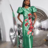 Green satin midi pencil dress with red floral embroidery and puff sleeves