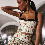 Floral bustier crop top with black velvet trim and adjustable straps