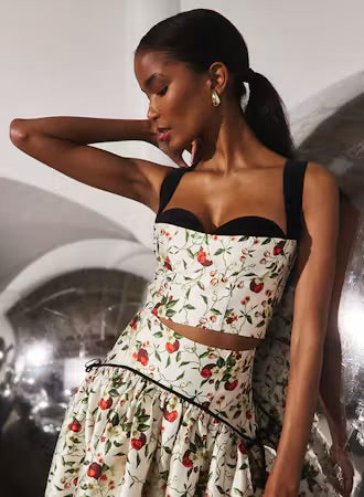 Floral bustier crop top with black velvet trim and adjustable straps
