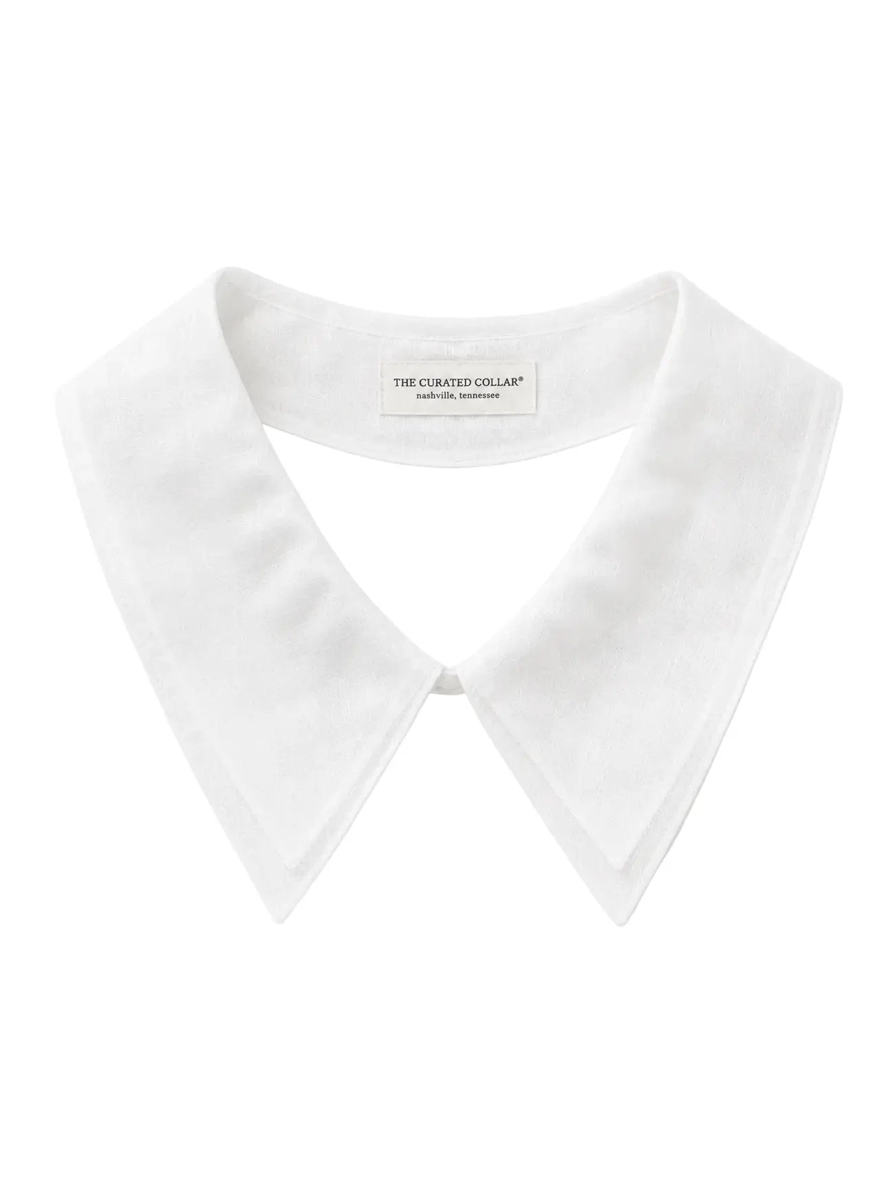 White detachable Peter Pan collar with elongated pointed tips and faux pearl closure
