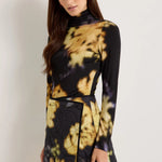 Long-sleeve turtleneck top in black and gold tie-dye floral knit print