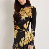 Long-sleeve turtleneck top in black and gold tie-dye floral knit print