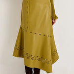Olive green laser-cut leather midi skirt with asymmetric hem and floral perforations