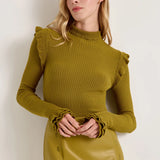 Olive green ribbed turtleneck sweater with ruffle shoulders and ruffled cuffs