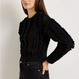 Black cable-knit wool crewneck sweater with ruffle trim accents and ribbed cuffs