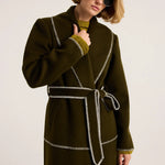 Olive green wool wrap coat with white contrast blanket stitching and self-tie belt