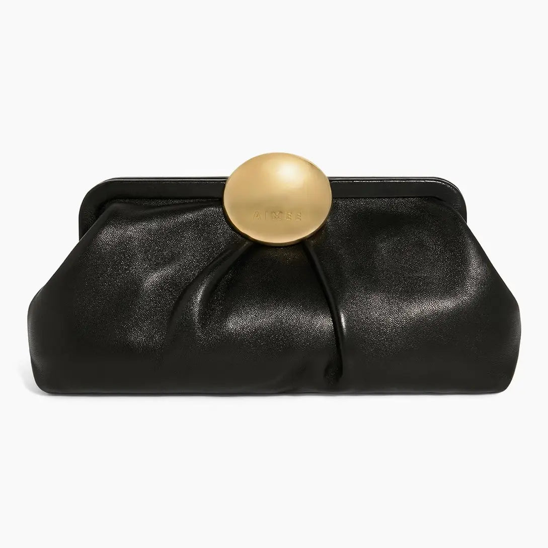 Black leather clutch bag with gold circular engraved clasp and front pleating