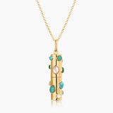 Gold capsule pendant necklace with turquoise stones and pearls on rolo chain