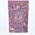 Zorro Pecans dark chocolate pecan bark 8oz purple bag with fox illustrations