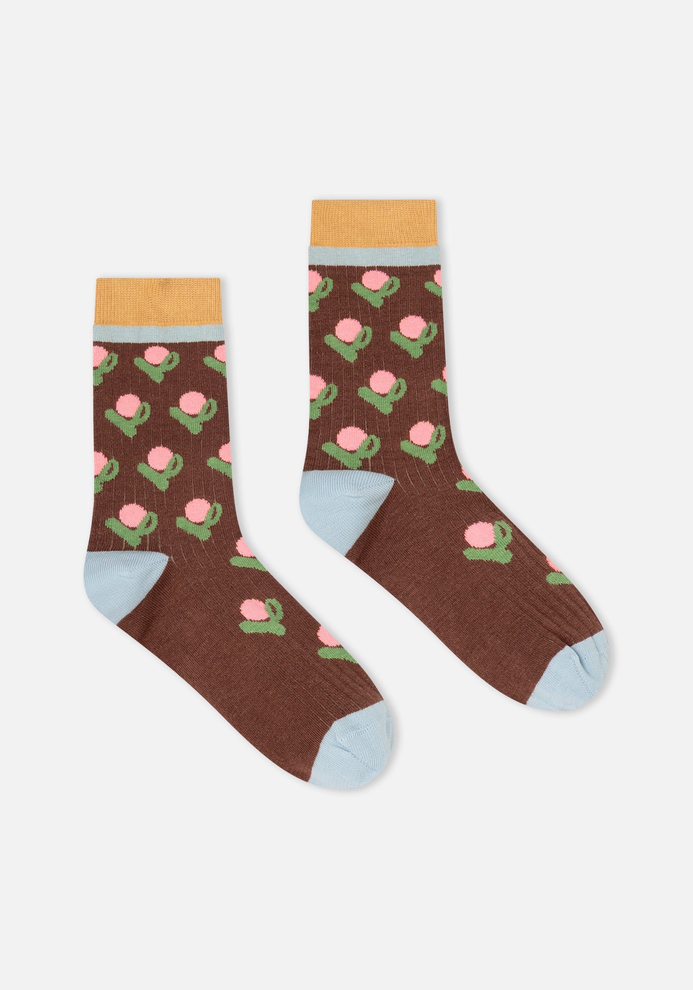 Brown crew socks with cactus floral print, yellow cuff, and light blue heel and toe