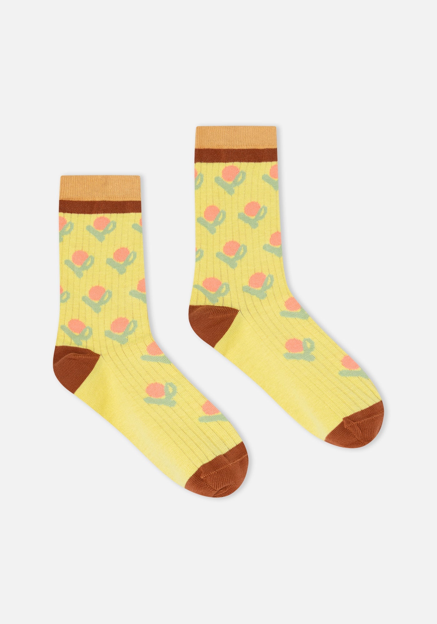 Yellow ribbed crew socks with floral pattern, brown heel, toe, and cuff stripe.