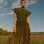 Olive green crochet lace top with flutter sleeves and scalloped hem detail