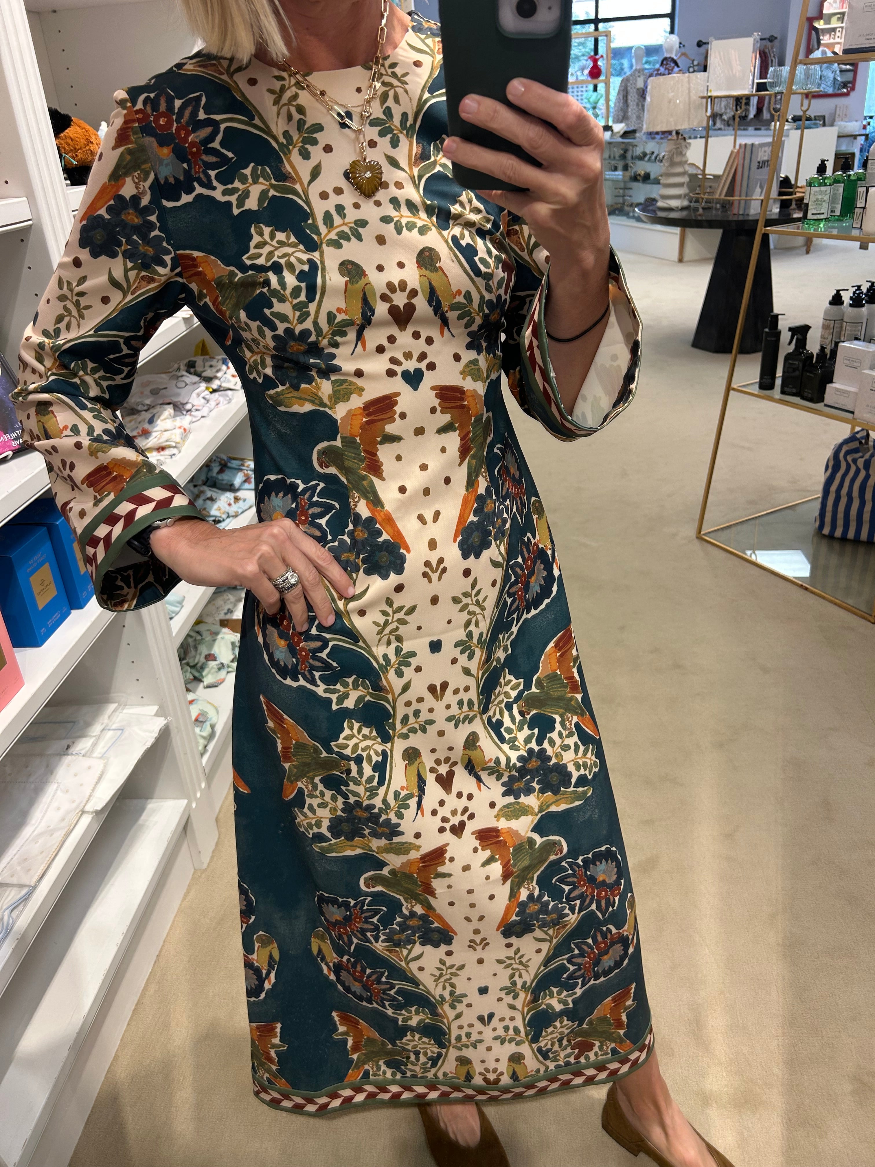 Hunter Bell Townes Dress in cream and teal floral parrot print with bell sleeves