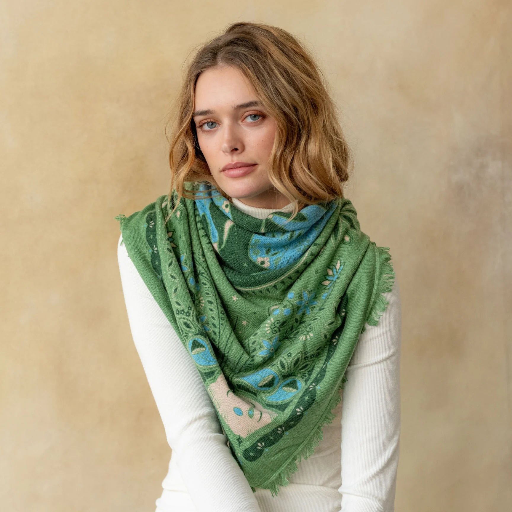 Green paisley celestial bird cashmere bandana wrap with blue and cream accents